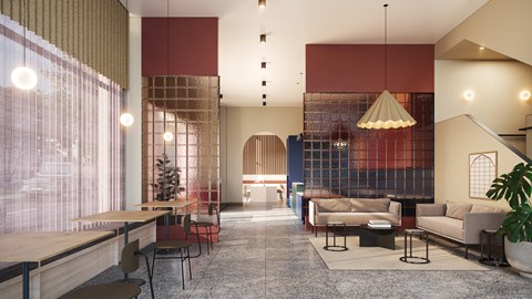 a lobby with couches tables and chairs and a bar