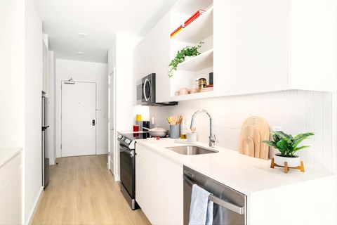 a kitchen with a sink and a counter top