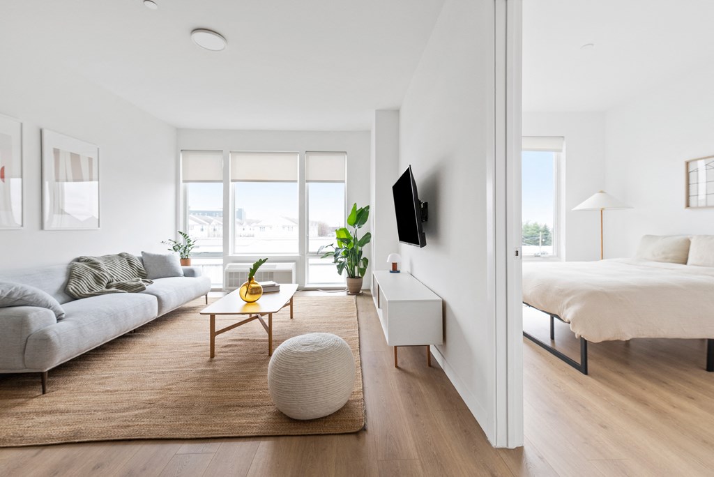 a living room with a couch and a table