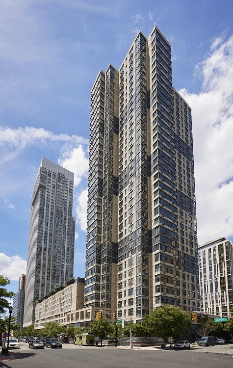 a tall building in the middle of a city