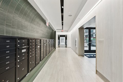a long hallway with lockers in a building