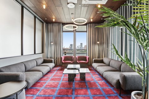 a lounge area with couches and a coffee table