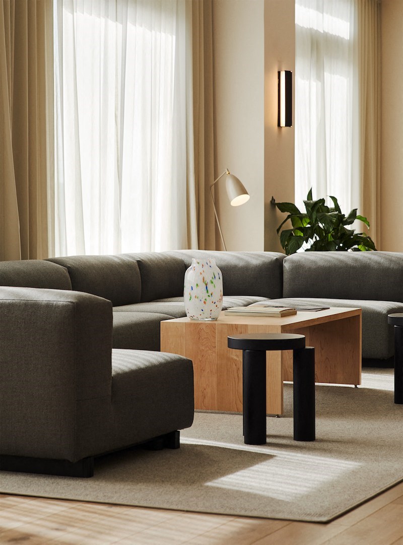 a living room with a couch and a coffee table