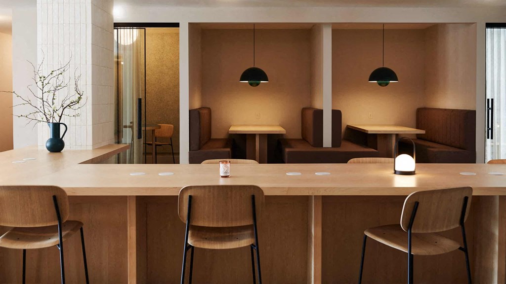 a room with a table and chairs