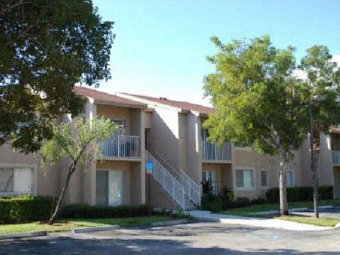 Apartment Building Exterior Surrounded by Trees