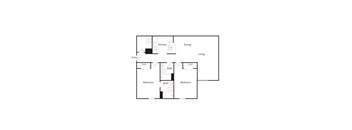 A floor plan of a house with a kitchen, dining and living room.