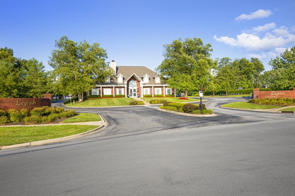an empty street with a building with stars on it