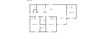 A floor plan of a house with a dining area, living room, and three bedrooms.