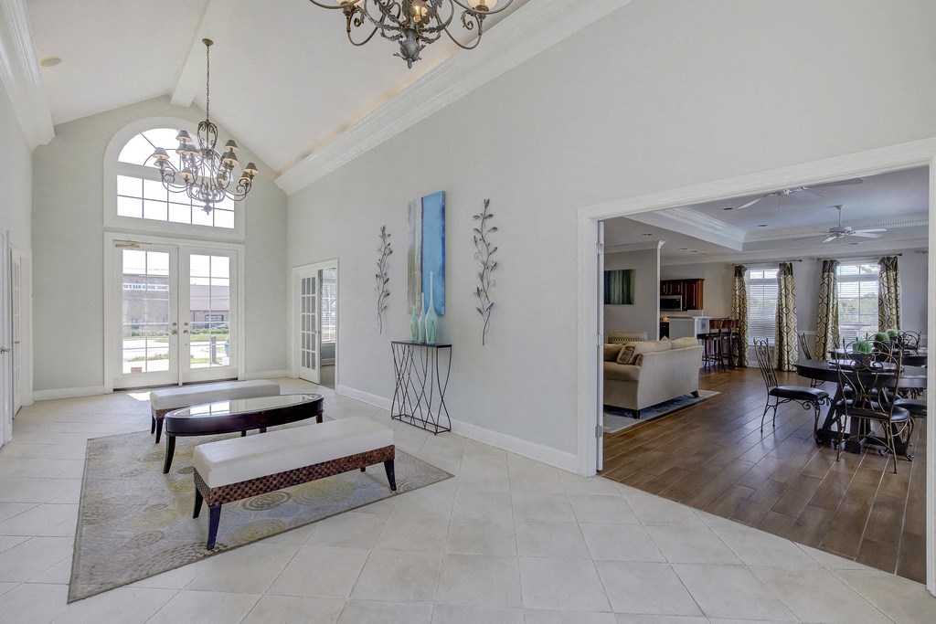 the living room is open to the dining room and kitchen