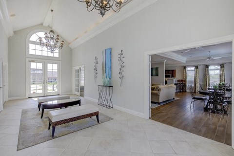the living room is open to the dining room and kitchen