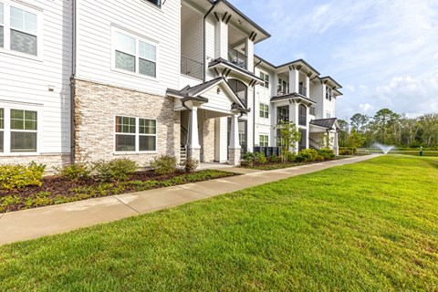 the preserve at ballantyne commons exterior of apartments with grass