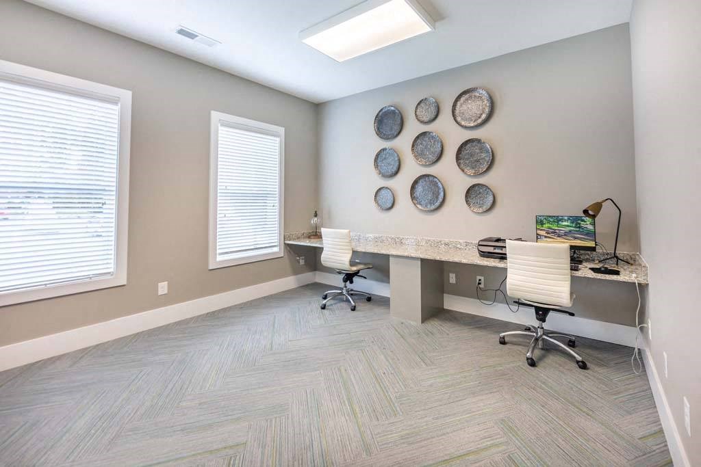 A room with a desk and a chair at Foxwood Apartments, Raleigh-Durham, North Carolina