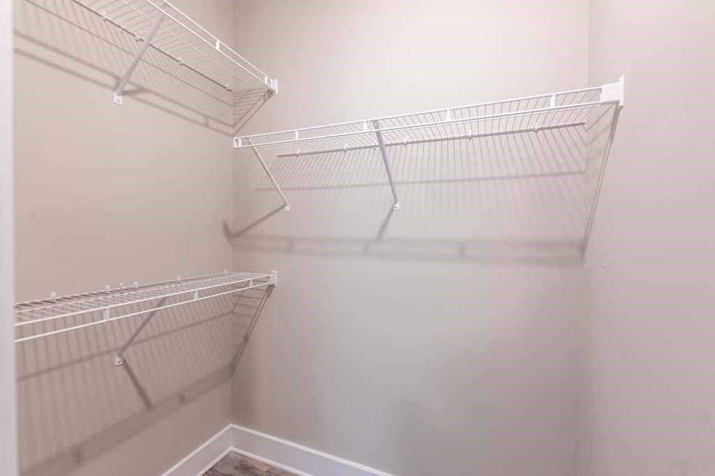 Empty white shelves in a room at Foxwood Apartments, Raleigh-Durham, NC, 27616