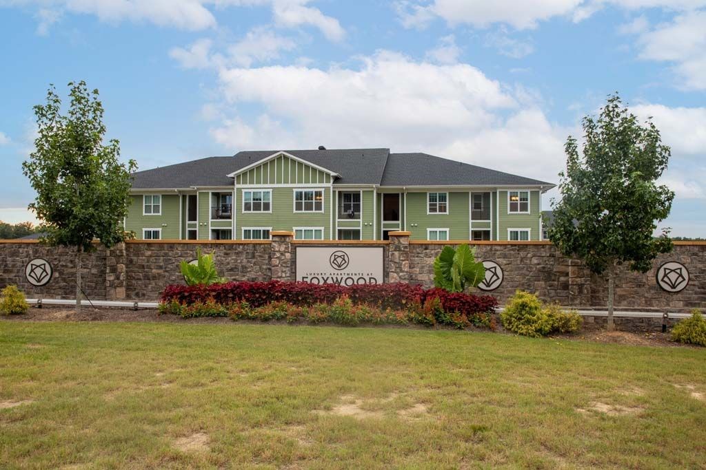 A building with a sign at Foxwood Apartments, Raleigh-Durham, North Carolina