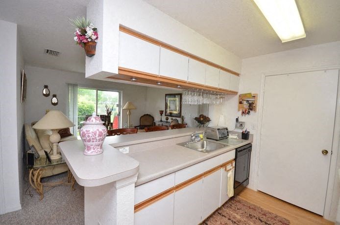 Kitchen With White Counter Tops at River Park Place Apartments, Vero Beach, 32962