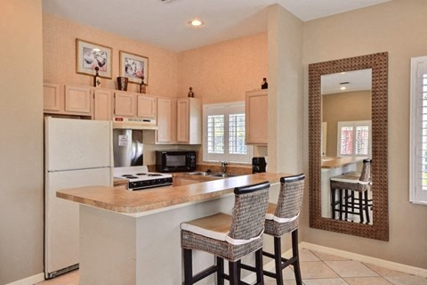 Clubhouse Kitchen With Refrigerator at River Park Place Apartments, Vero Beach, FL, 32962