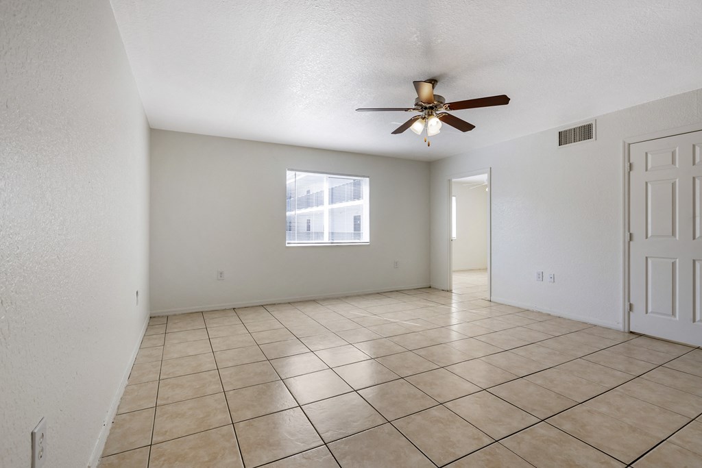 Tiled Room with Window and Ceiling Fan
