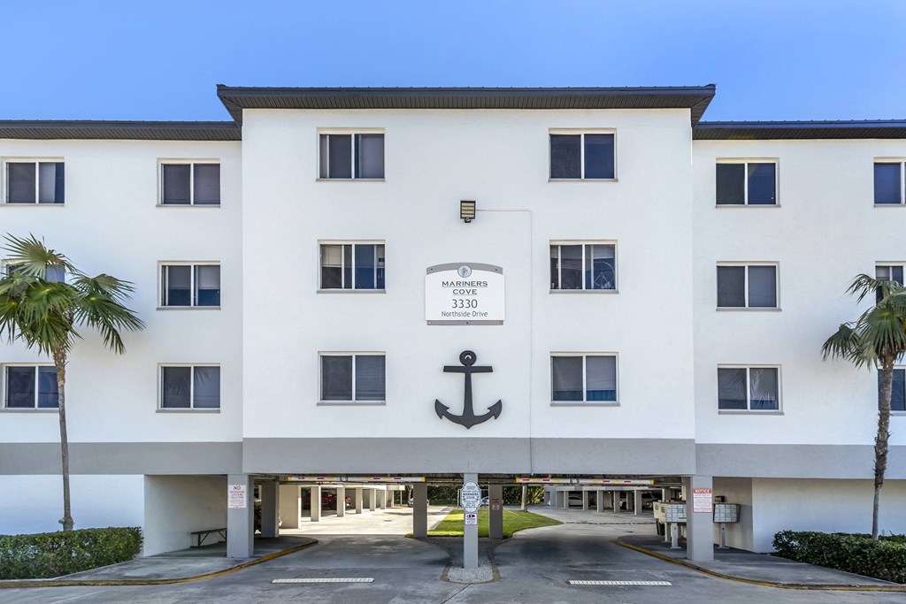 Apartment Building Exterior With Parking Lot