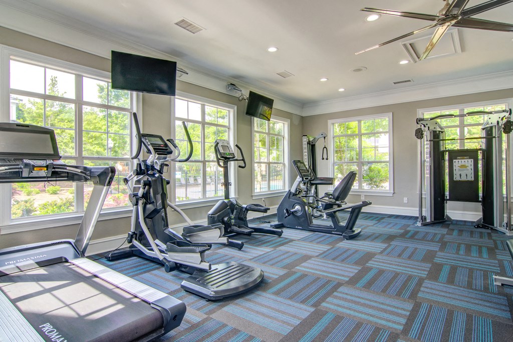 the preserve at ballantyne commons fitness room with cardio equipment and windows