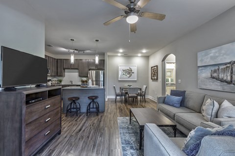 a living room with a couch and a tv
