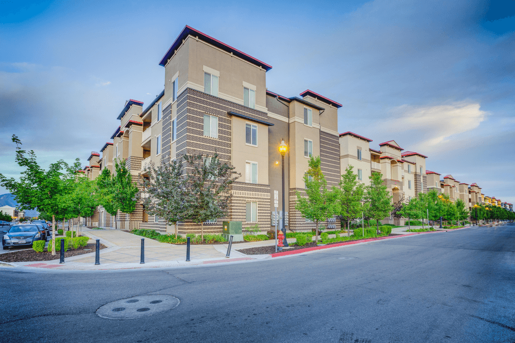 Apartment building with a street in front of it.