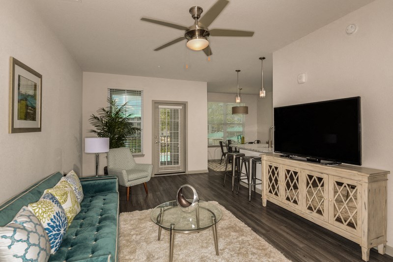 a living room with a couch and a tv