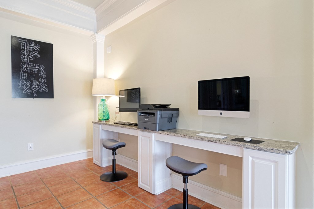 Business center with 2 computers.