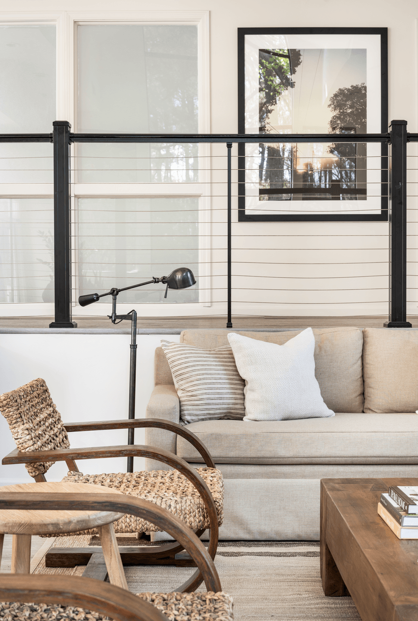 a living room with a sofa and chair at Bridges at Mallard Creek Apartment Homes, Charlotte, NC