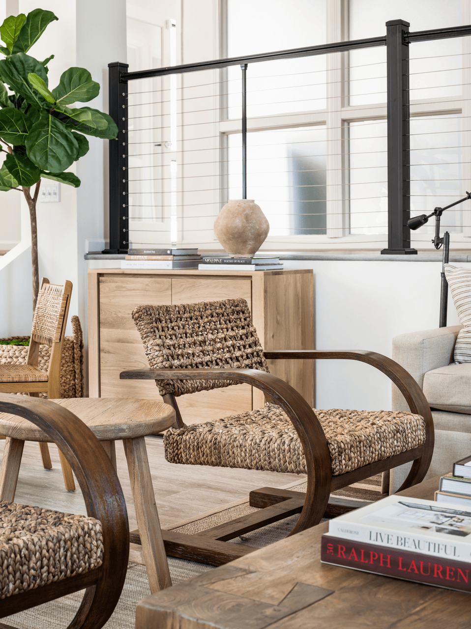 a living room filled with furniture and a large window at Bridges at Mallard Creek Apartment Homes, Charlotte, NC
