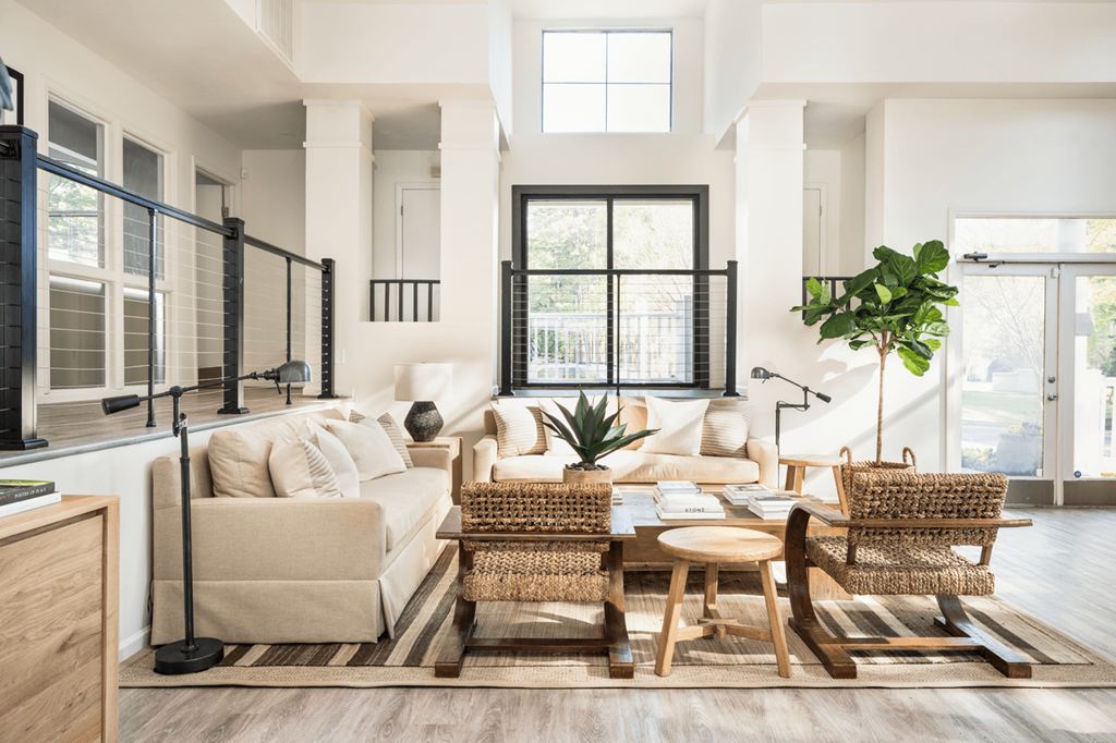a living room filled with furniture and a large window at Bridges at Mallard Creek Apartment Homes, Charlotte, 28269