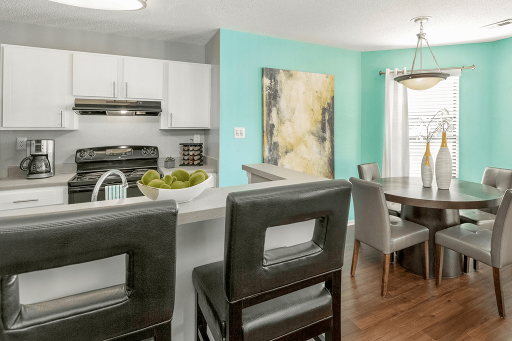Kitchen And Dining Area at Bridges at Mallard Creek Apartment Homes, North Carolina