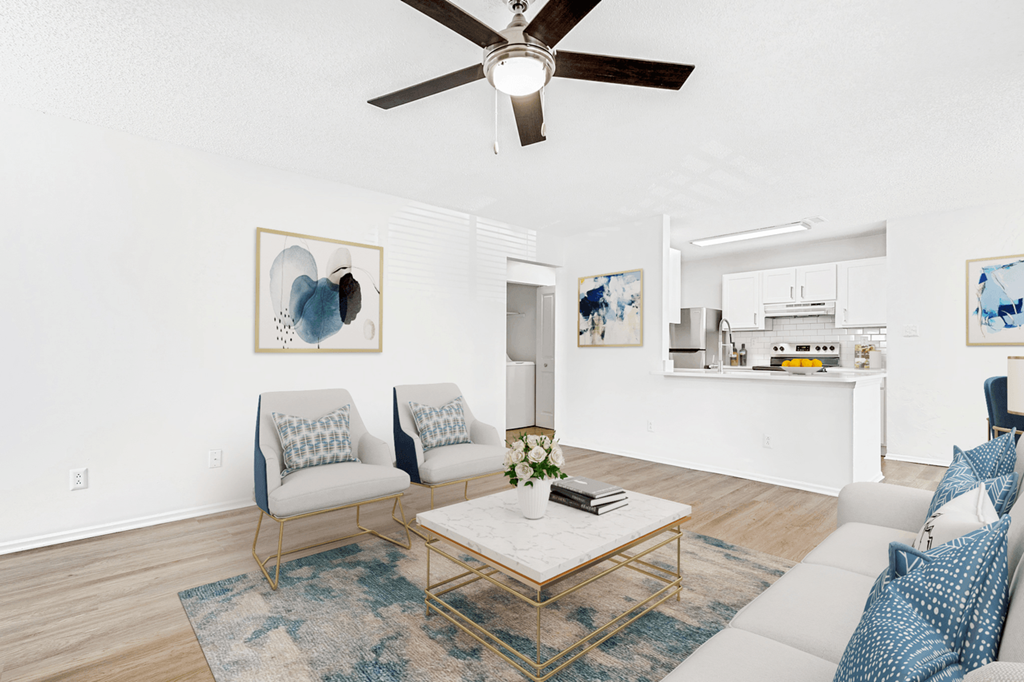 a living room with two couches and a coffee table at Bridges at Mallard Creek Apartment Homes, Charlotte, 28269