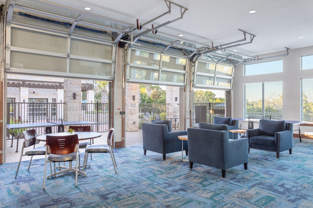 clubhouse with firehouse style garage doors