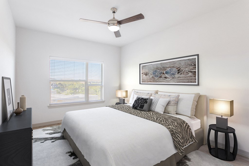 furnished bedroom with ceiling fan