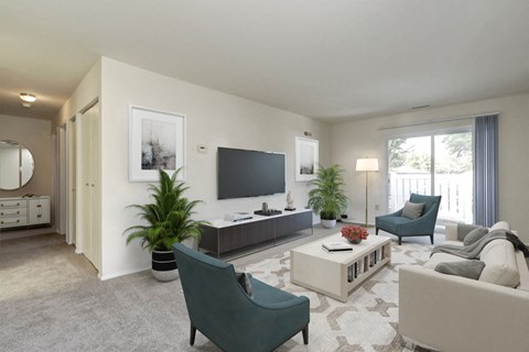 A living room with a grey carpet and a white sofa.