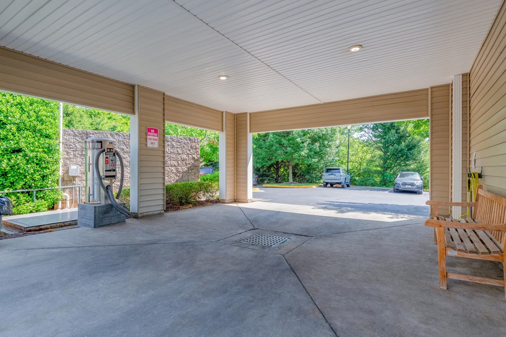 covered driveway with car washing equipment