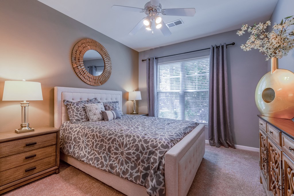 bedroom with a large bed and window