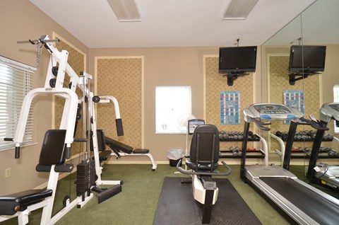 Fitness Center with Exercise Equipment at River Park Place Apartments, Vero Beach, FL
