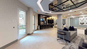 Interior of resident clubroom facing sitting area and resident kitchen area - Photo Gallery 102