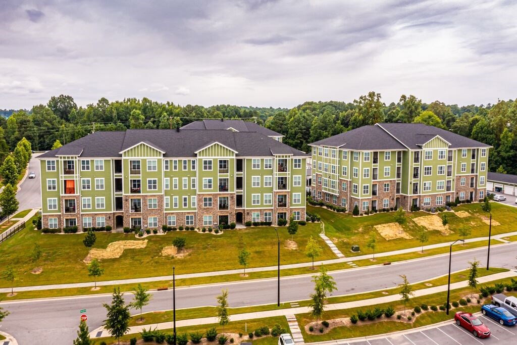 A large apartment complex with multiple buildings and parking lots at Foxwood Apartments, North Carolina
