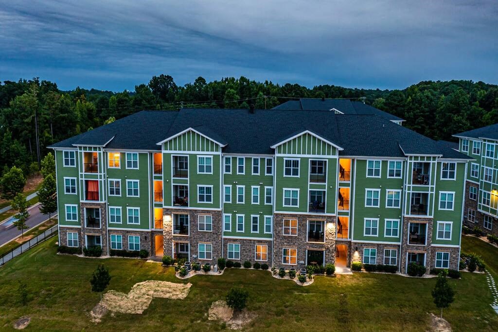 A large apartment complex with multiple buildings and balconies at Foxwood Apartments, Raleigh-Durham, North Carolina