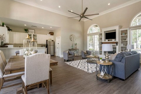 A modern living room with a dining table and a couch.