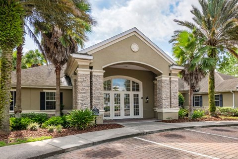 Leasing office exterior with native landscaping