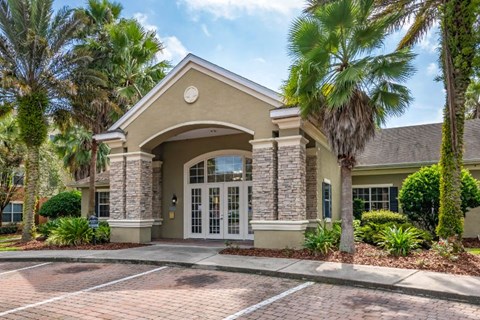 Leasing office exterior with native landscaping
