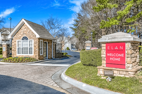 a house with a welcome home sign in front of it at Elan at Mallard Creek Apartment Homes, North Carolina, 28269