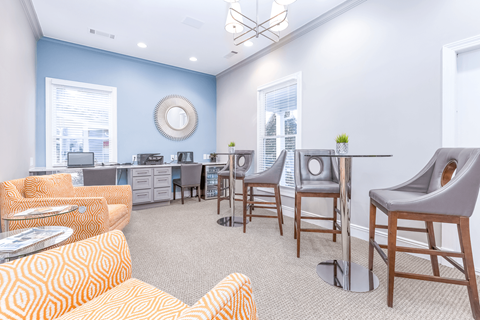the reserve at bucklin hill leasing office with couches and chairs at Elan at Mallard Creek Apartment Homes, Charlotte, NC, 28269