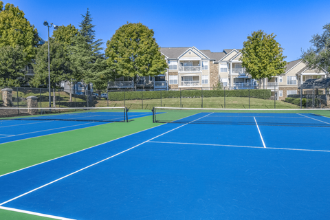 take a swing at one of our tennis courts at Elan at Mallard Creek Apartment Homes, Charlotte, 28269
