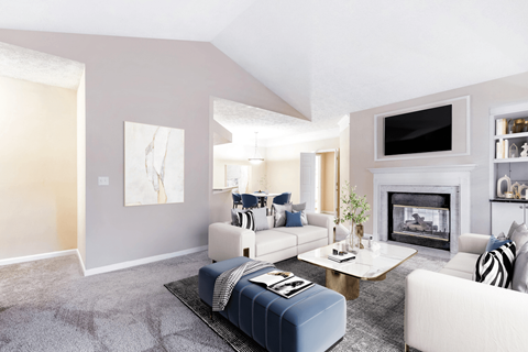a living room filled with furniture and a flat screen tv at Elan at Mallard Creek Apartment Homes, Charlotte