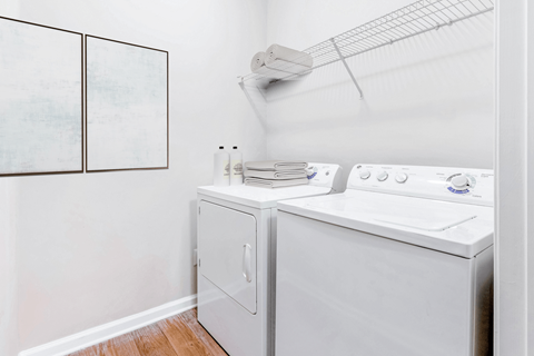 a laundry room with a washer and dryer at Elan at Mallard Creek Apartment Homes, Charlotte, 28269