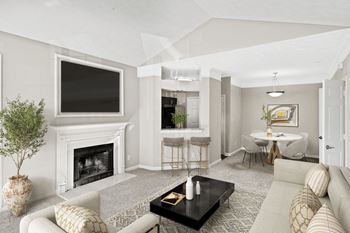 A living room with a fireplace and a television on the wall at Elan at Mallard Creek Apartment Homes, North Carolina, 28269